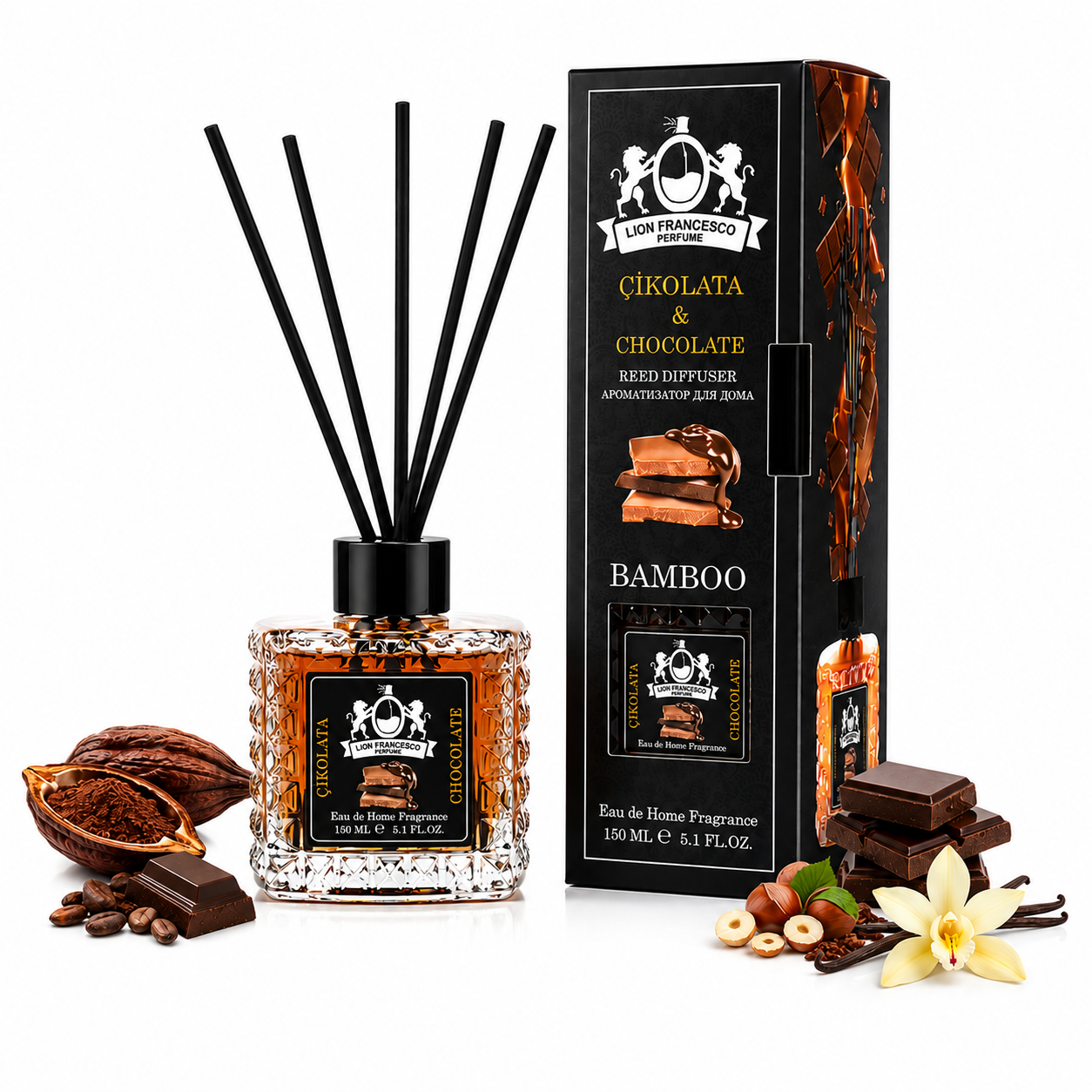 A reed diffuser bottle with black reeds and a matching black-and-gold box, shown on a white studio background with chocolate pieces, hazelnuts, vanilla flower, and cinnamon sticks arranged around the product. The packaging and labels read Cokolata & Chocolate, Bamboo, and a prominent San Francisco Fragrances mark.