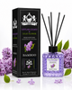 Lion Francisco Reed Diffuser in Lilac Flower and Bamboo scent, featuring a black box, a clear bottle filled with lavender beads, and bamboo reeds, styled with purple lilac flowers and green leaves on a white background.