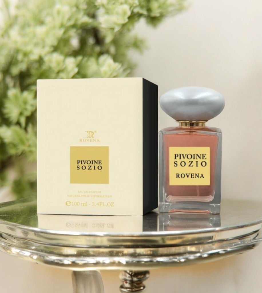 Rovena Pivoine Sozio — pink bottle with a grey domed cap next to a cream and gold box on a silver tray