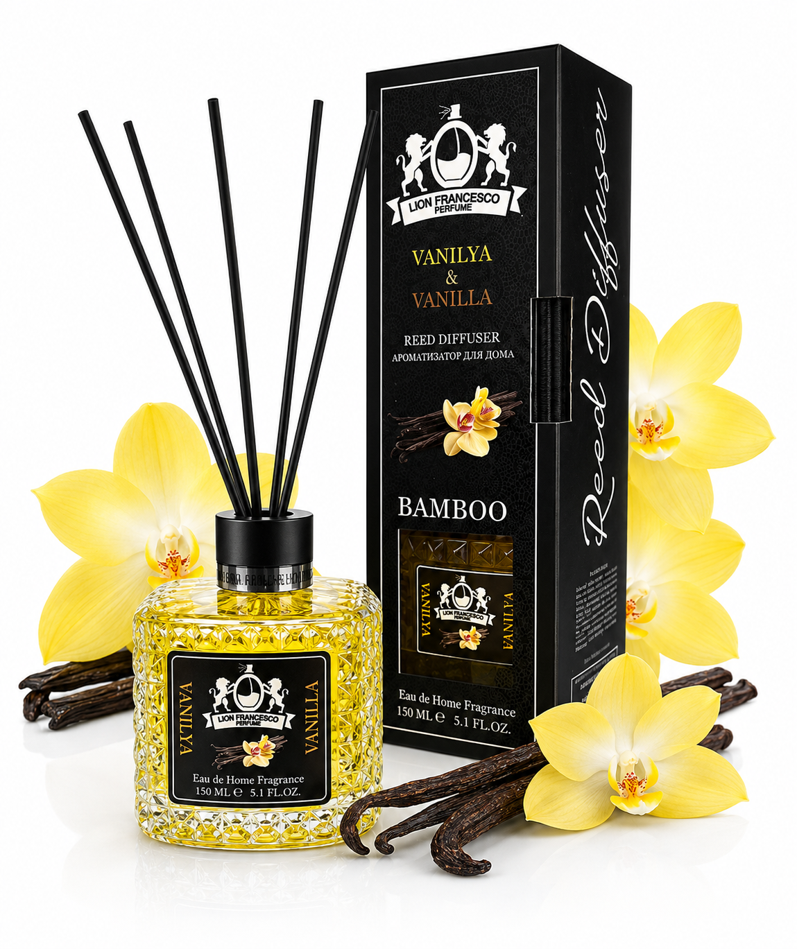 A reed diffuser bottle filled with yellow fragrance beads and black reeds, shown next to its black branded box. Yellow orchid flowers and vanilla beans are styled around the product on a clean white background.