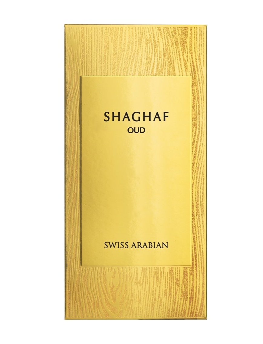 Shaghaf Oud 985 by Swiss Arabian EDP — gold box with wood grain texture and a gold label in dark lettering
